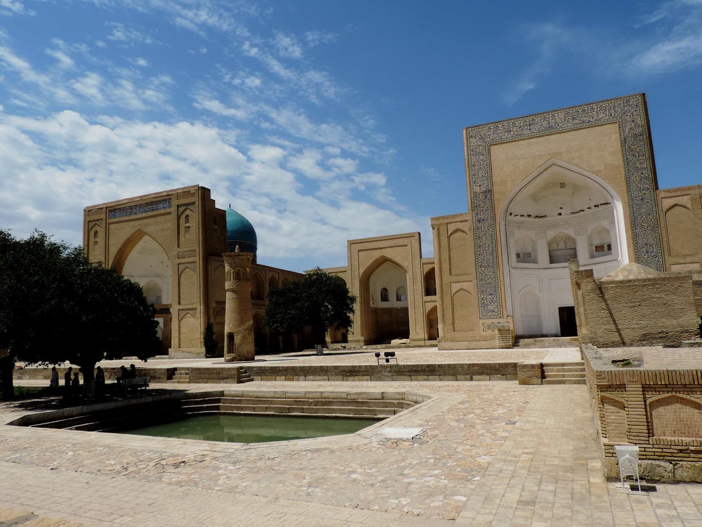 The courtyard, pond and turquoise dome of the Chor-Bakr ensemble