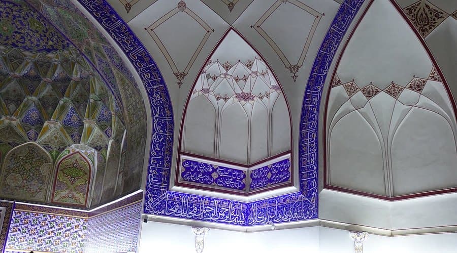 The white vaults and blue calligraphy of the winter prayer hall