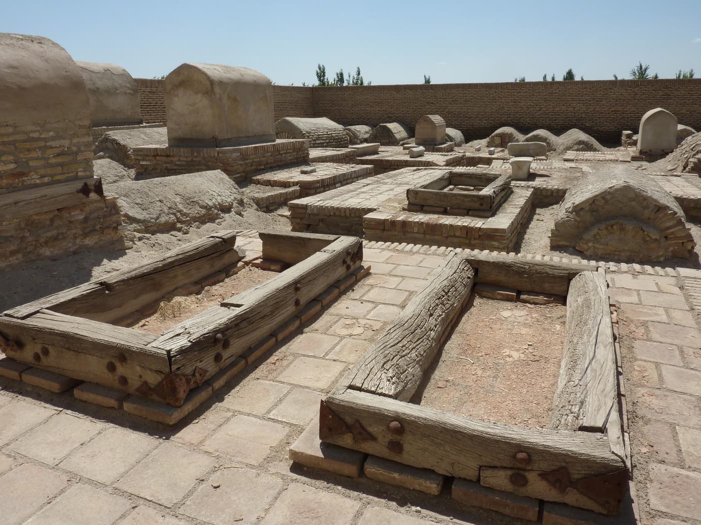 Wooden grave frames and brick tombs in the Chor-Bakr necropolis