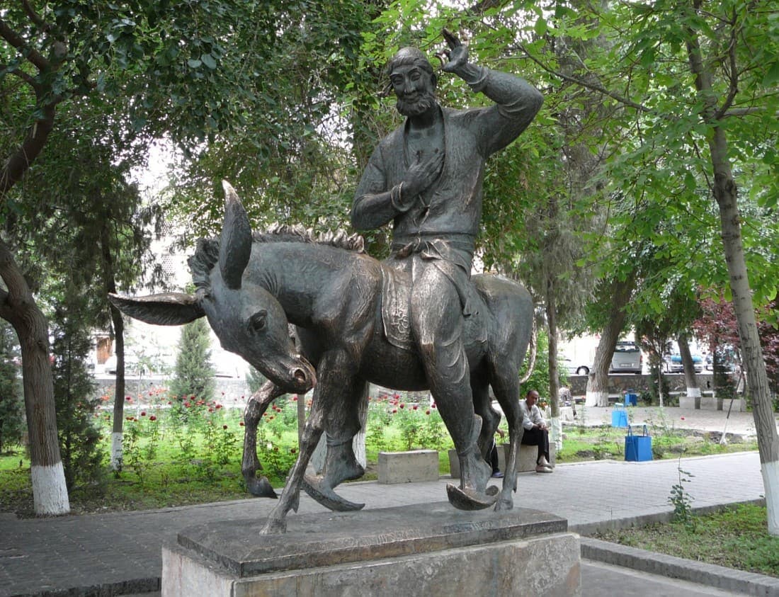 Nasreddin and his donkey seen from the park path