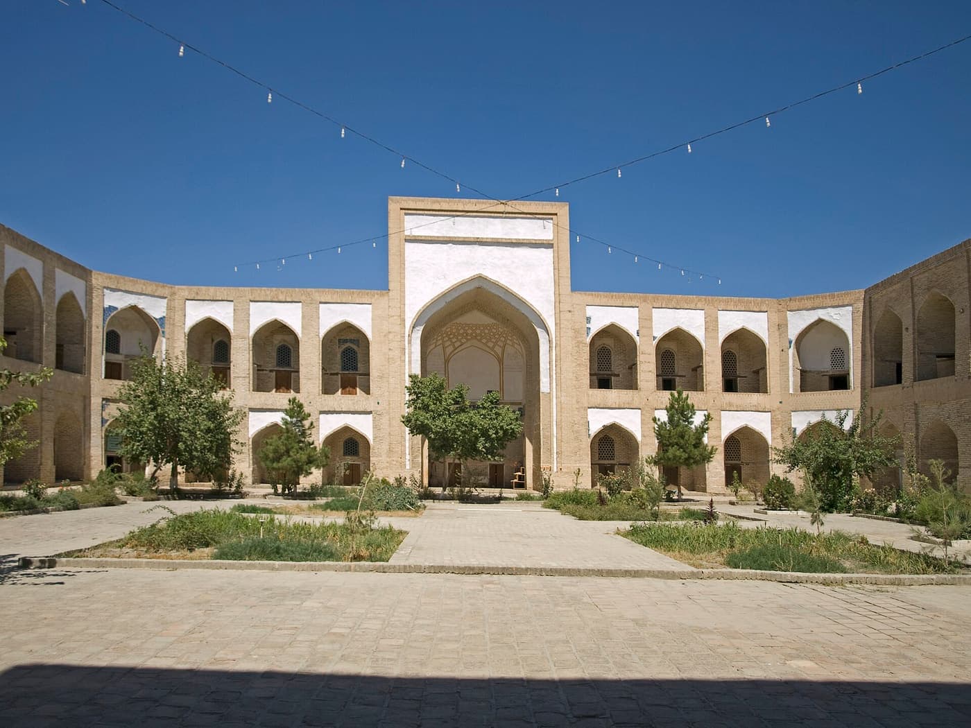 The bare brick courtyard of the Kukeldash Madrasa