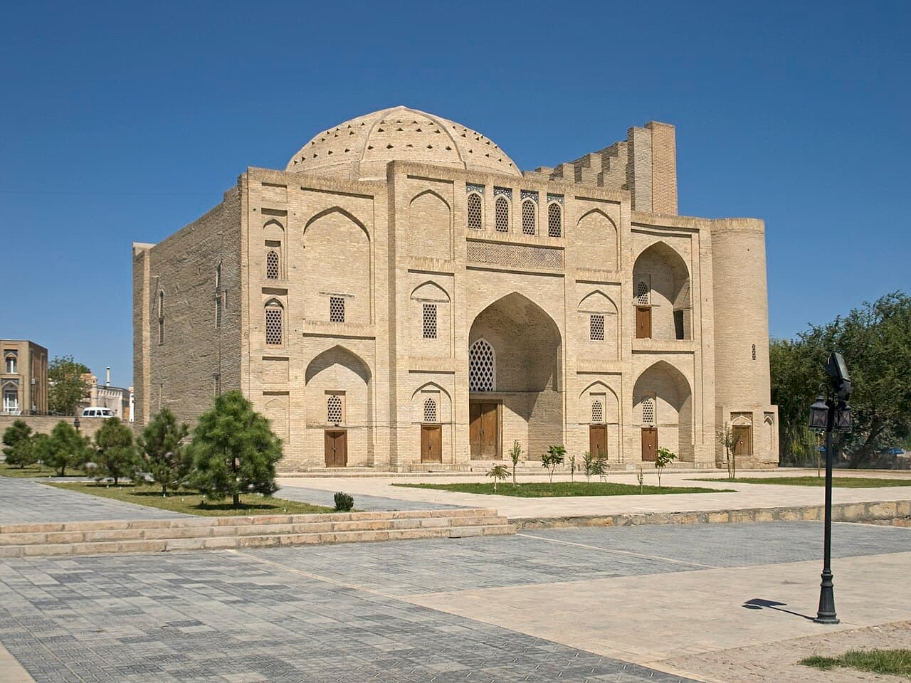 The khanqah from the south, its ribbed dome visible behind the portal